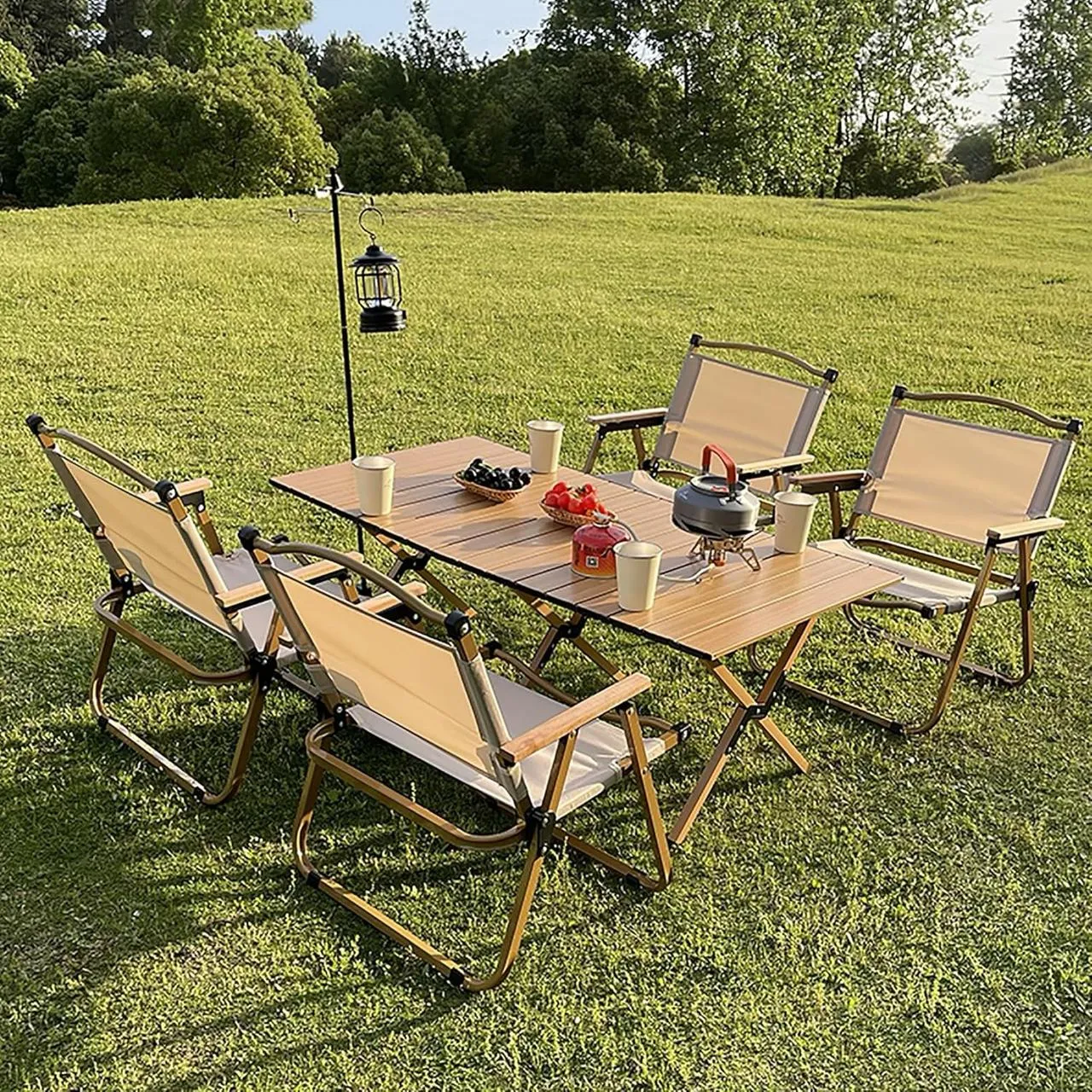 Foldable camping table with chairs and storage box