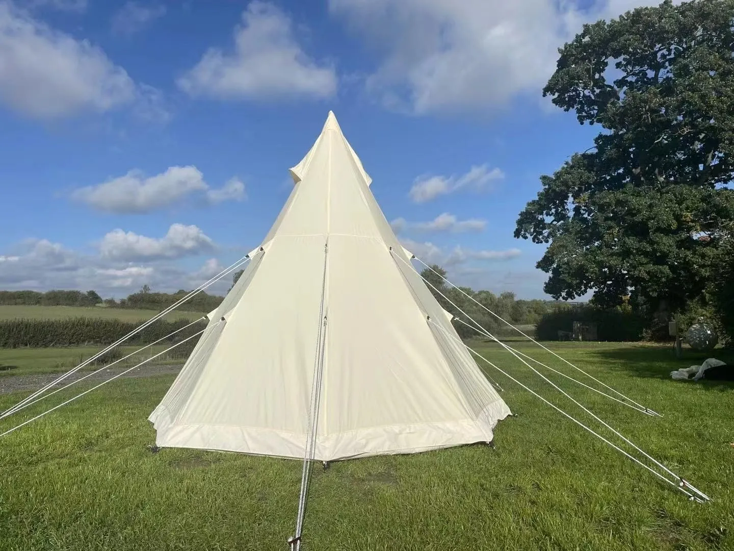 Spacious and Durable 4-Season Canvas Tipi Tent for Luxury Camping, Easy Setup, Fits 3-4 People, Aluminum Pole, Custom Camouflage