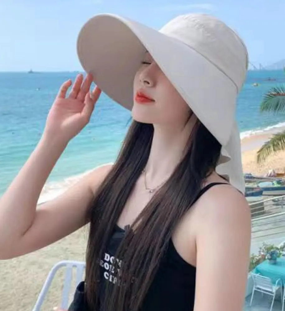 Sun Hat for Women UPF 50  Wide Brim Bucket Cap Ponytail Hole UV Protection Summer Beach Travel Visor Hat with Neck Flap