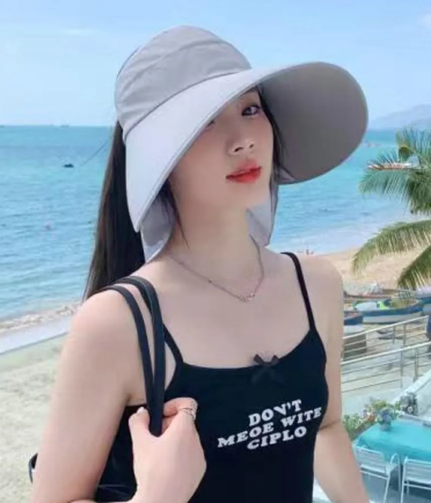 Sun Hat for Women UPF 50  Wide Brim Bucket Cap Ponytail Hole UV Protection Summer Beach Travel Visor Hat with Neck Flap