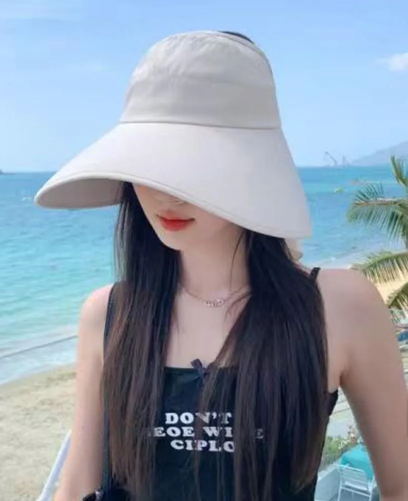 Sun Hat for Women UPF 50  Wide Brim Bucket Cap Ponytail Hole UV Protection Summer Beach Travel Visor Hat with Neck Flap